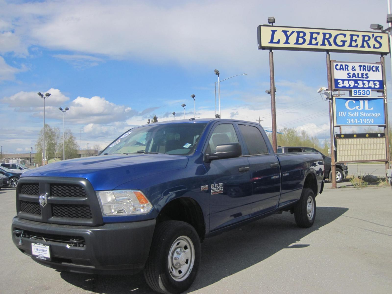 2016 blue /gray RAM 2500 Tradesman Crew Cab 4WD (3C6TR5HTXGG) with an 5.7L V8 OHV 16V engine, automatic transmission, located at 9530 Old Seward Highway, Anchorage, AK, 99515, (907) 349-3343, 61.134140, -149.865570 - Low miles in this Ram 2500 come take a test drive - Photo #1